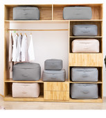 Nagy kapacitású egyszínű ruházat paplan porálló tároló táska vastag mozgó poggyász csomagoló táska ruhásszekrény befejező műtárgy