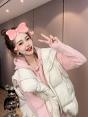 Széles modellű női mellény, zsebbel és cipzárral