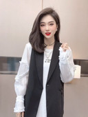 Elegáns női mellény gombokkal