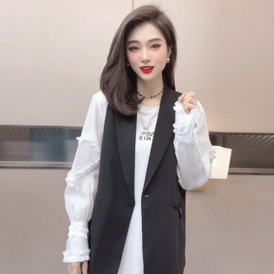 Elegáns női mellény gombokkal