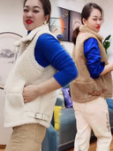 Női kabát zsebekkel