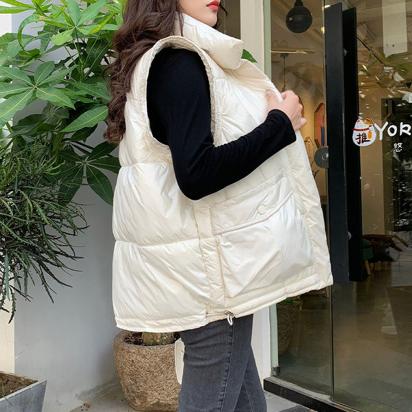 Közepes hosszúságú széles mintás női mellény