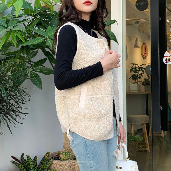 Női gyapjú mellény cipzárral és zsebbel