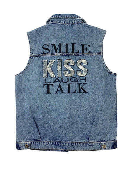 Moderan ženski prsluk s vezom