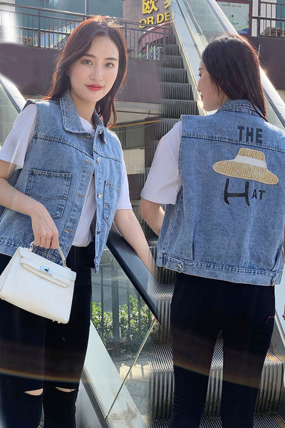 Női farmermellény zsebbel