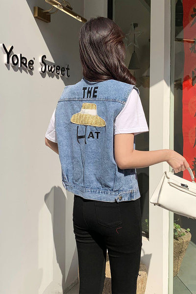 Női farmermellény zsebbel