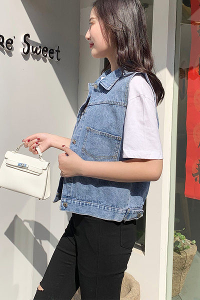 Női farmermellény zsebbel