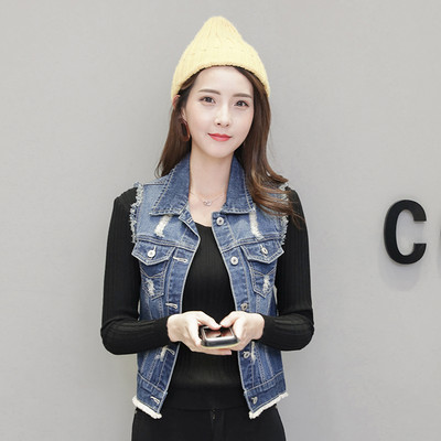 Ženski traper prsluk sa poderanim motivima