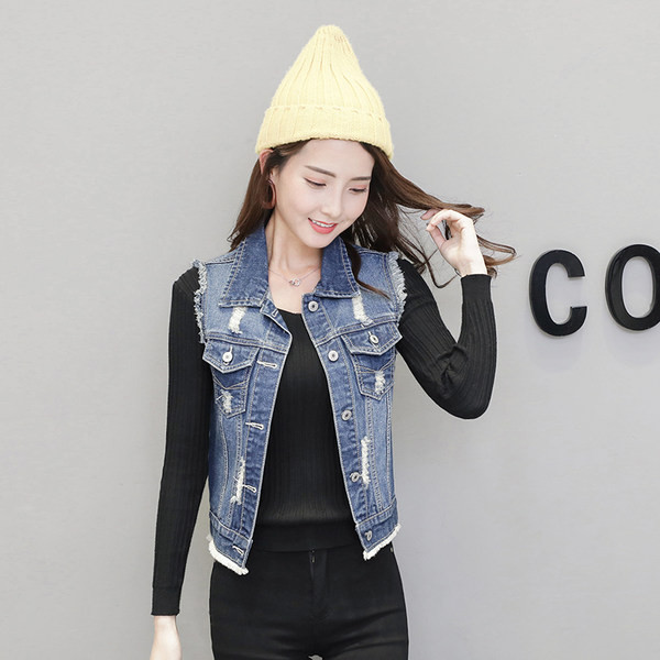 Ženski traper prsluk sa poderanim motivima