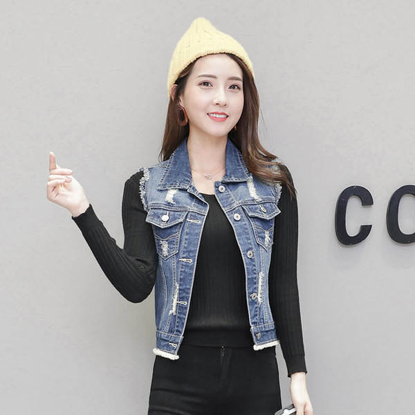 Ženski traper prsluk sa poderanim motivima