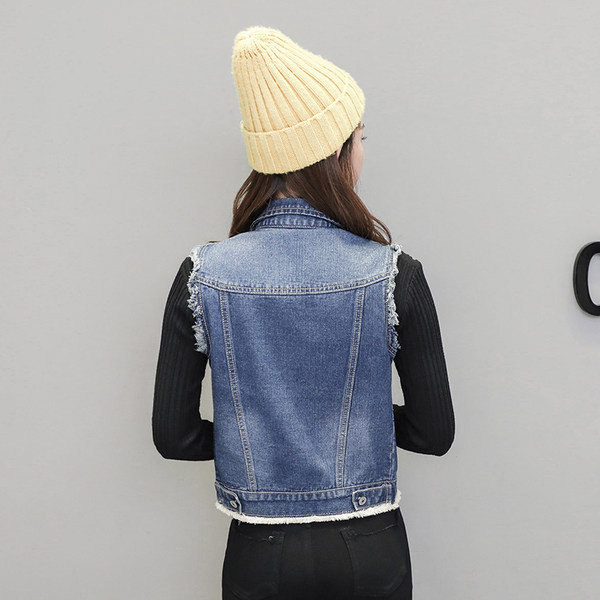 Ženski traper prsluk sa poderanim motivima