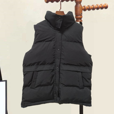 Ženski prsluk s visokim ovratnikom i džepom