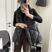 Női mellény cipzárral és gombokkal