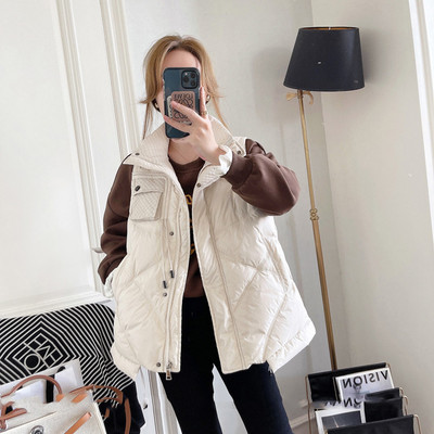 Női mellény cipzárral és gombokkal