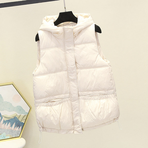 Gombos és cipzáros női mellény