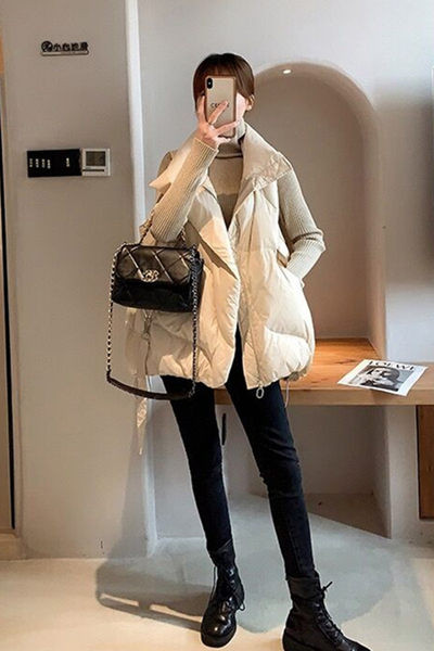 Női széles mellény gallérral, zsebbel és cipzárral