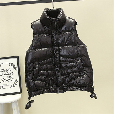 Női mellény cipzárral és gombokkal