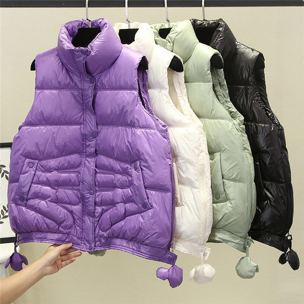 Női mellény cipzárral és gombokkal