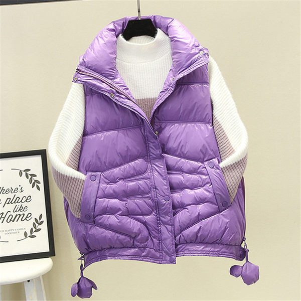 Női mellény cipzárral és gombokkal