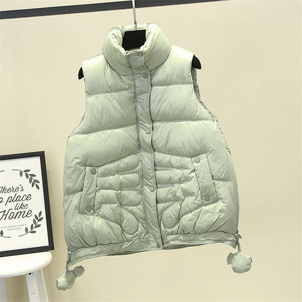 Női mellény cipzárral és gombokkal