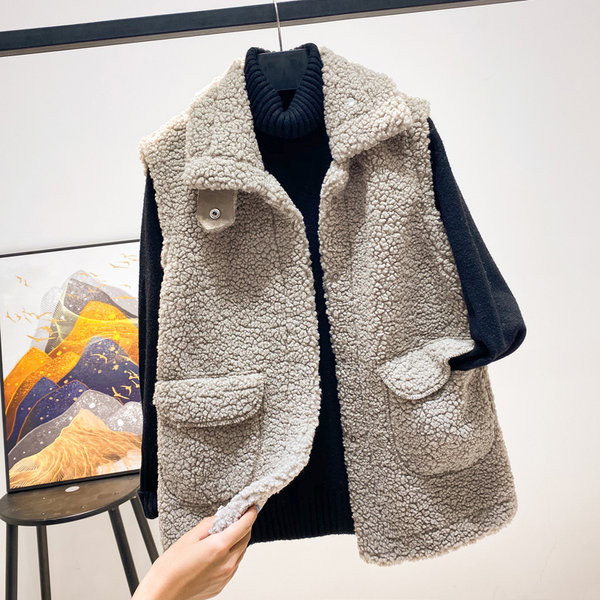 Ležerna ženska perjanica s džepovima