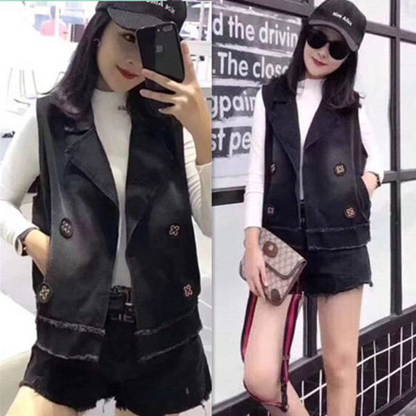 Női farmermellény felirattal