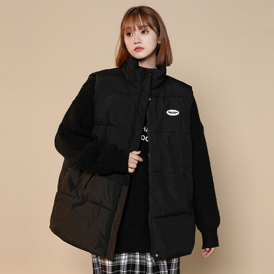 Női alkalmi mellény hímzéssel és magas gallérral