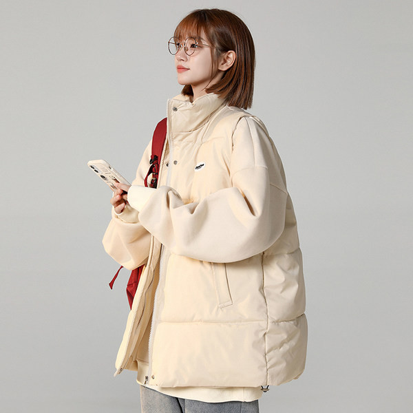 Női alkalmi mellény hímzéssel és magas gallérral