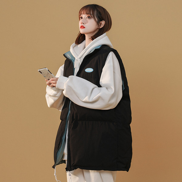 Ženski široki prsluk s kragnom i patentnim zatvaračem