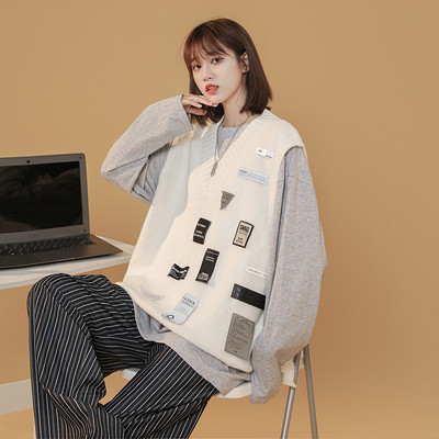 Moteriška vintažinė liemenė su V formos iškirpte