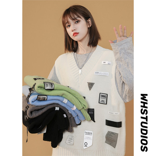 Moteriška vintažinė liemenė su V formos iškirpte