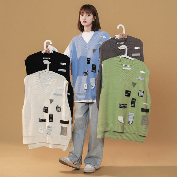 Moteriška vintažinė liemenė su V formos iškirpte