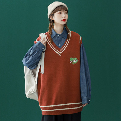 Moteriška V formos kaklo liemenė su siuvinėjimu