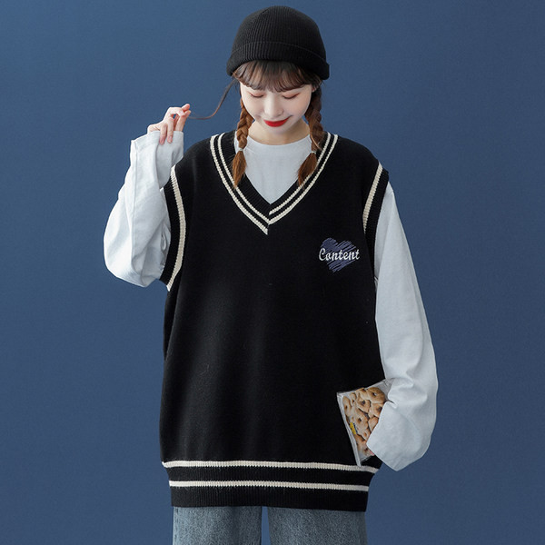 Moteriška V formos kaklo liemenė su siuvinėjimu