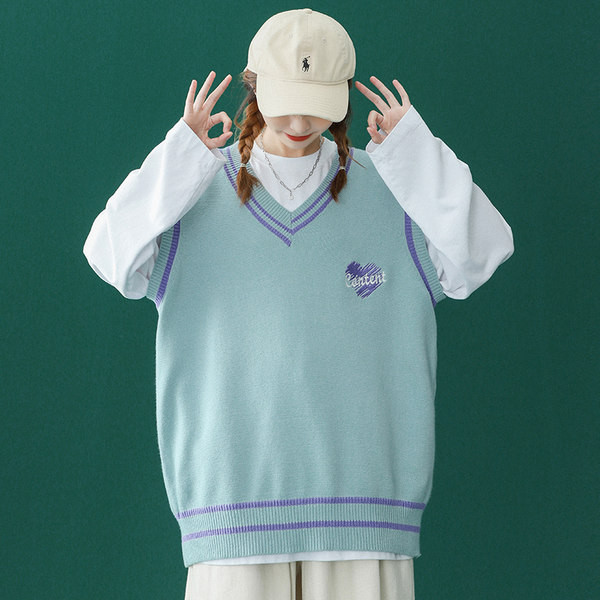 Moteriška V formos kaklo liemenė su siuvinėjimu