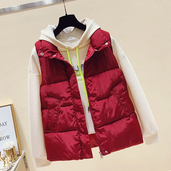 Ležeran ženski prsluk s patentnim zatvaračem i džepom