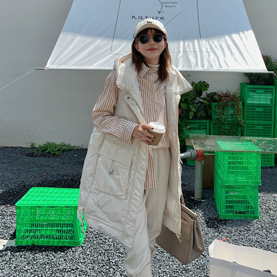 Jesensko-zimski široki prsluk s kapuljačom srednje dužine