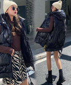 Ženski jesensko-zimski prsluk srednje dužine