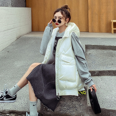 Ženski jesensko-zimski prsluk srednje dužine