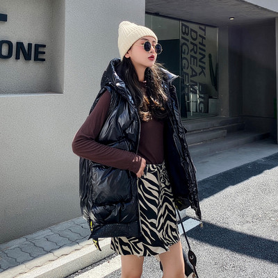 Ženski jesensko-zimski prsluk srednje dužine