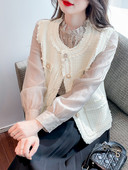 Elegáns női mellény gombokkal és zsebbel