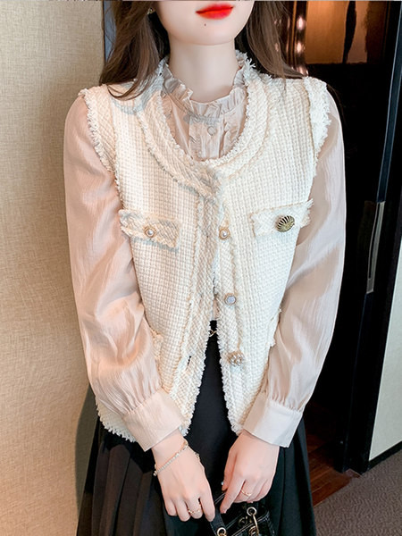 Elegáns női mellény gombokkal és zsebbel