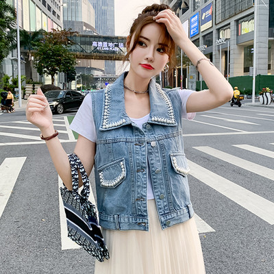 Moteriška džinsinė liemenė su dekoratyviniais perlais