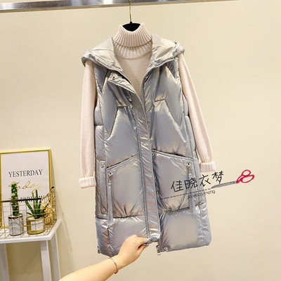 Női mellény kapucnival és zsebbel