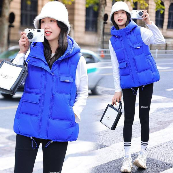 Női mellény zsebekkel és magas gallérral