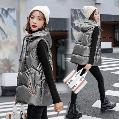 Ženski prsluk s kapuljačom i vezama