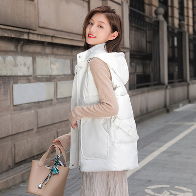 Ženski jesenski prsluk s džepovima - srednje dužine