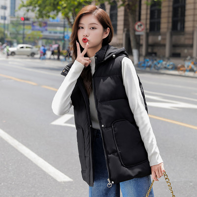 Ženski jesenski prsluk s džepovima - srednje dužine