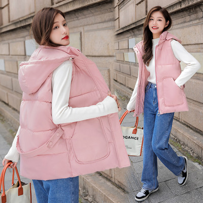 Ženski jesenski prsluk s džepovima - srednje dužine