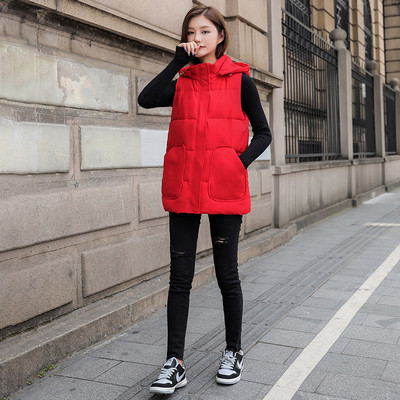 Ženski jesenski prsluk s džepovima - srednje dužine